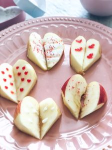 heart shaped apple slices: A healthy valentine's Day treat for the kids