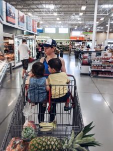 mom with children in grocery store