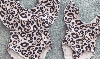 leopard-print-mother-daughter-matching-swimsuits-flat-lay-next-to-each-other