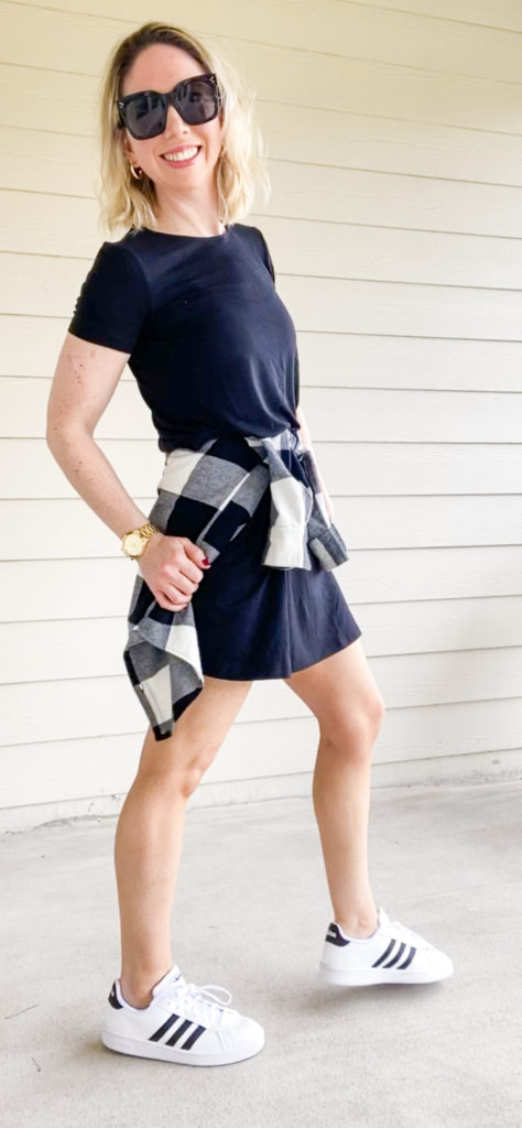 flannel-shirt-tied-around-the-waist-over-tshirt-dress-and-paired-with-sneakers